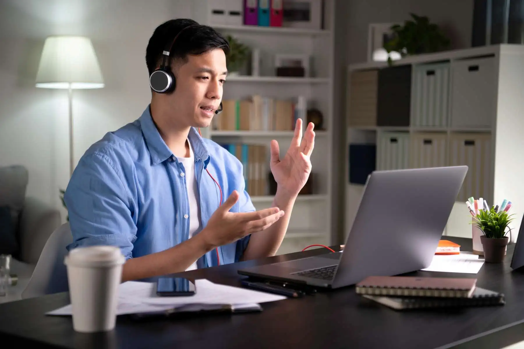 A Fractional CTO provides guidance to a software team during a remote meeting.