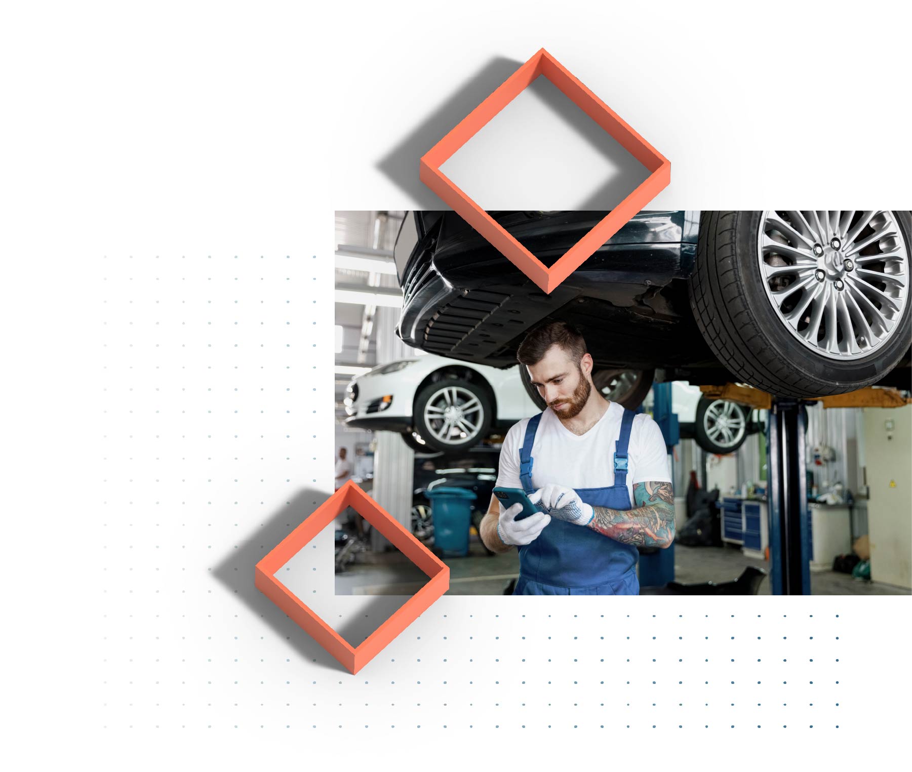 Mechanic in his auto shop using a mobile phone app to log information about the vehicle he is working on.